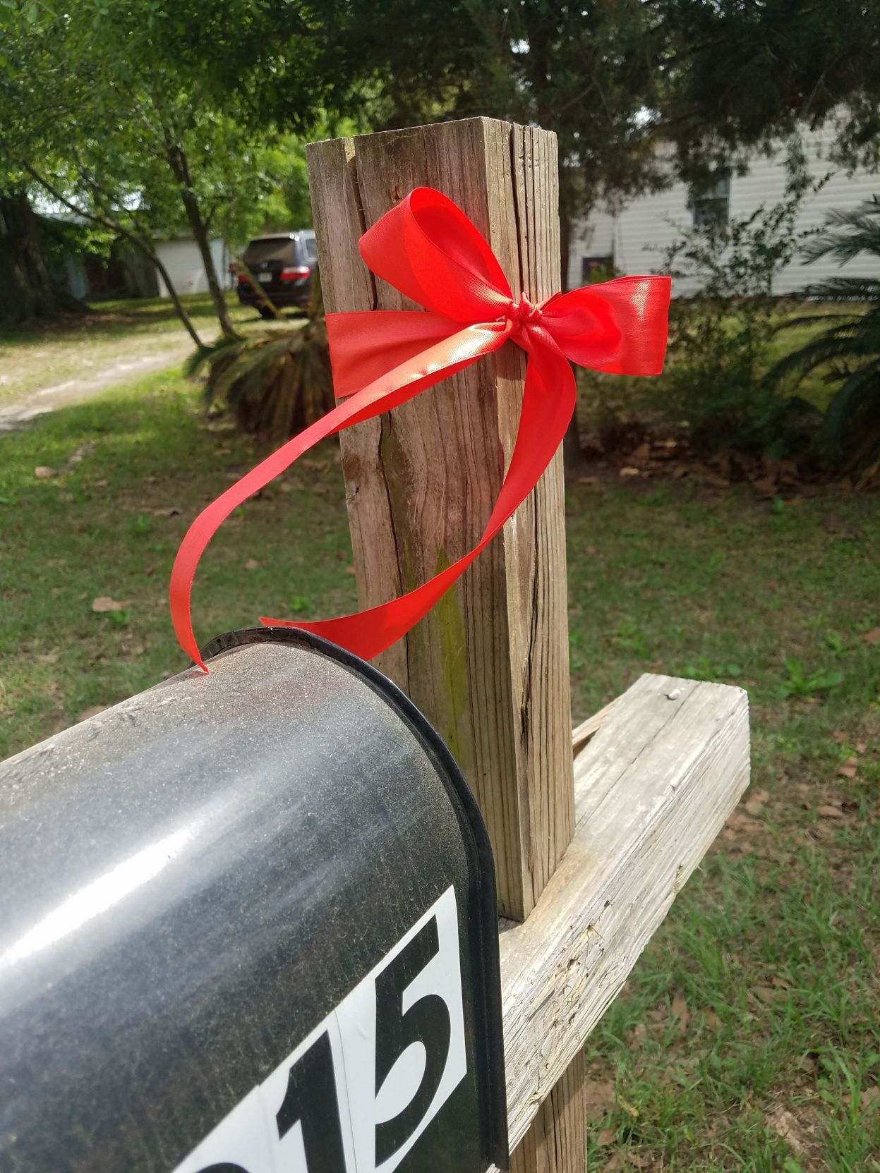 Red ribbons offer sign of faith, Covid-19